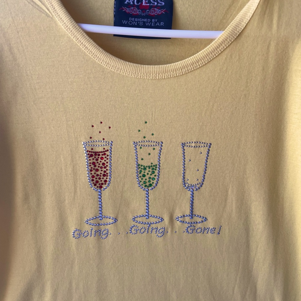 Aces brand size L & XL Rhinestoned T-shirts. Reads: “Going…Going…Gone!”